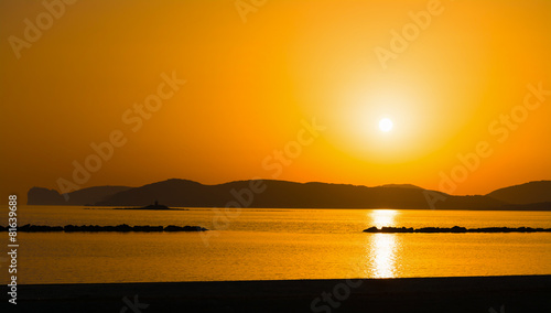 orange sunset in Alghero shoreline