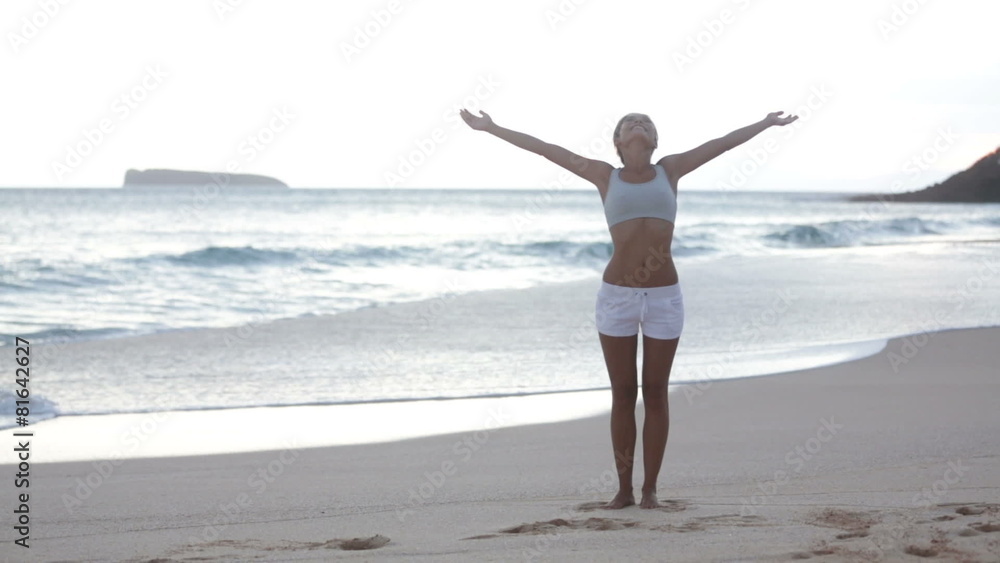 Free woman enjoying freedom feeling happy at beach Free woman enjoying freedom feeling happy at beach