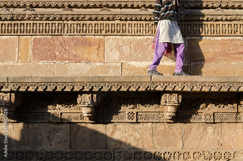 Indian woman walking on beautiful border patterns & designs engr