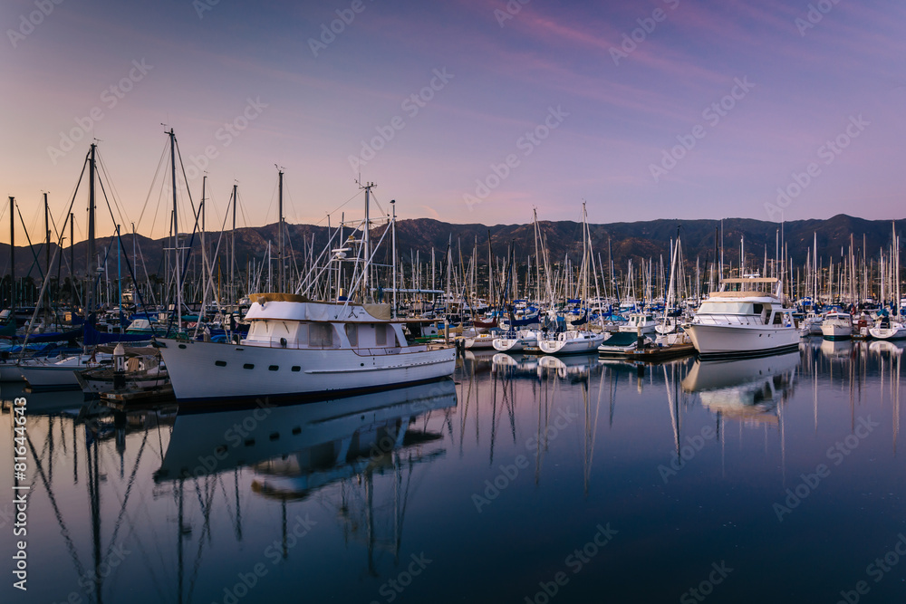 Boats in the harbor at sunset, in Santa Barbara, California.