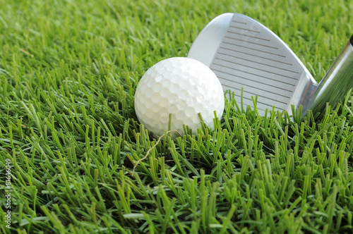 Golf ball about to be hit