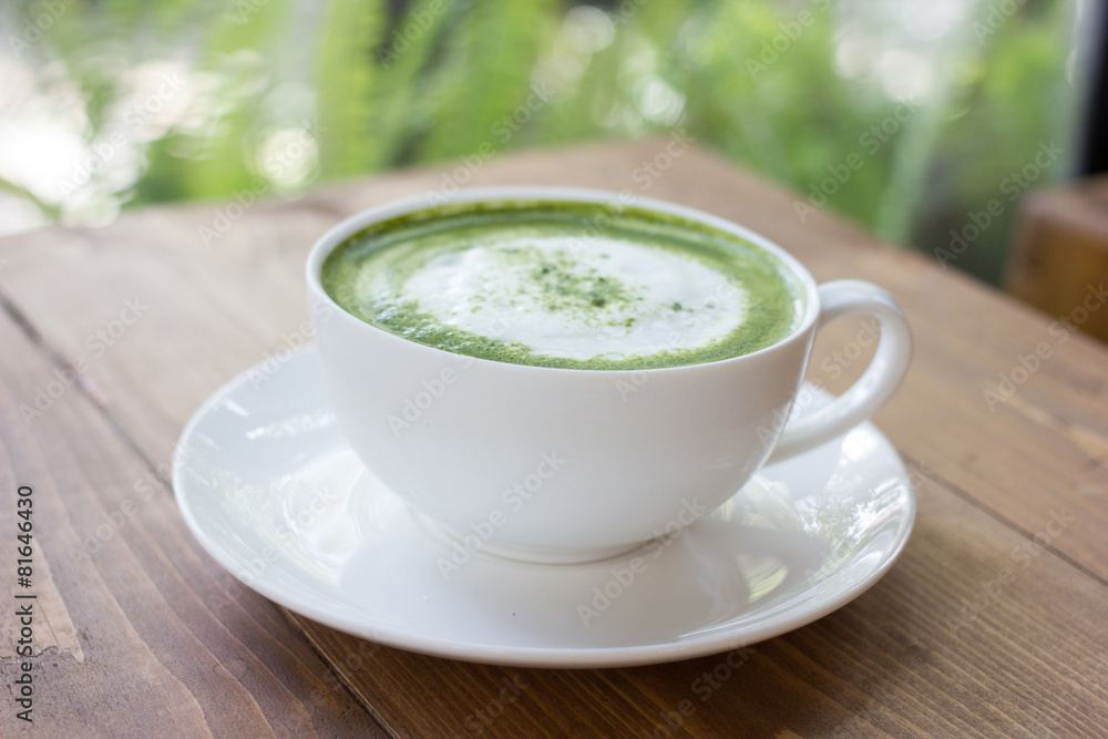 Matcha green tea latte beverage in glass. Matcha green tea latte beverage in glass.