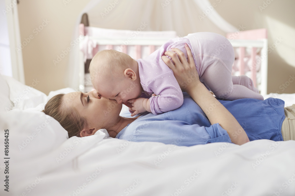 Cuddles with mommy in the bed Cuddles with mommy in the bed
