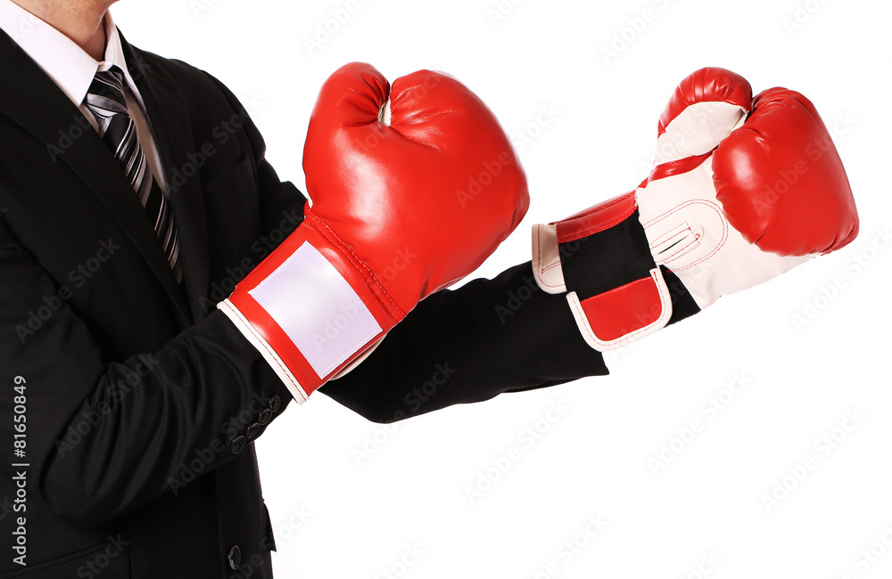 Businessman with boxing gloves isolated on white