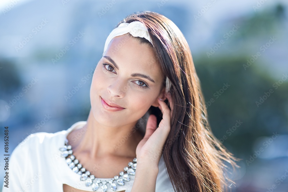 Fototapeta premium Gorgeous woman smiling at camera