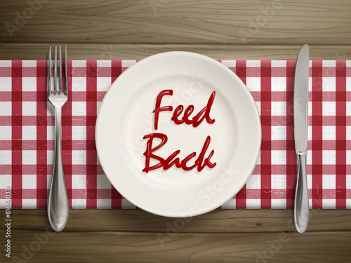 feedback word written by ketchup on a plate