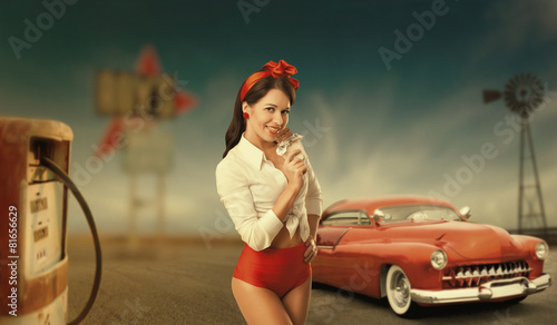 Retro pinup portrait of a pretty woman in a white shirt and.
