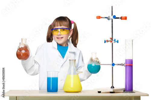 Little girl as chemist doing experiment with chemical fluid in
