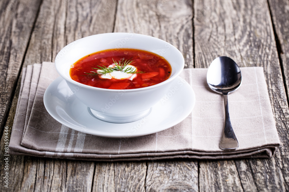 Tasty soup with bread on a wooden background. Tasty soup with bread on a wooden background.