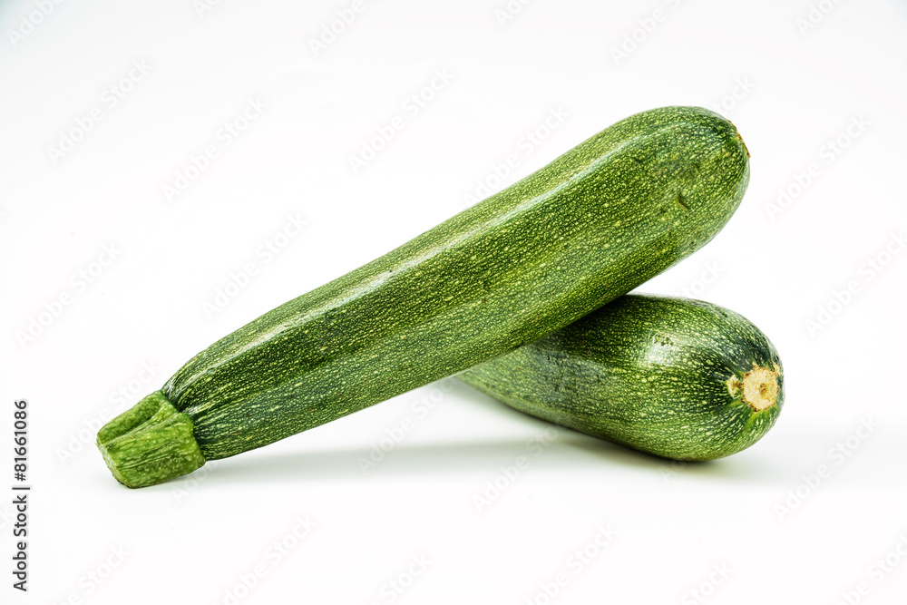 Fresh healthy green zucchini isolated on white background . Fresh healthy green zucchini isolated on white background .