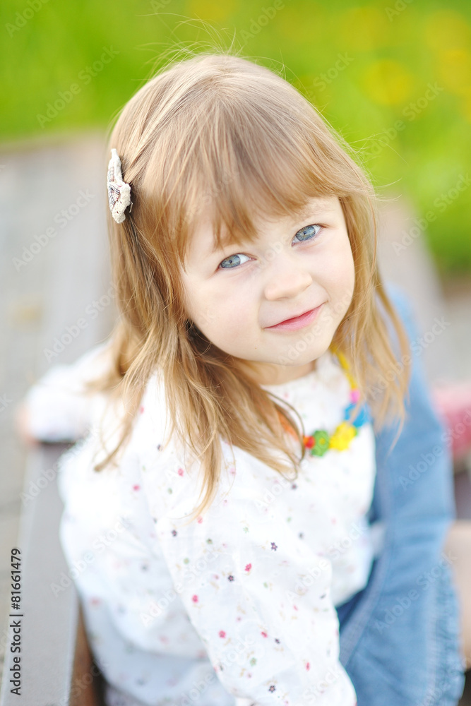portrait of little girl outdoors in summer portrait of little girl outdoors in summer