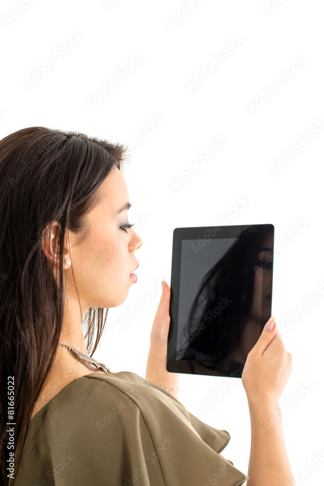 Attractive woman using a tablet computer Attractive woman using a tablet computer
