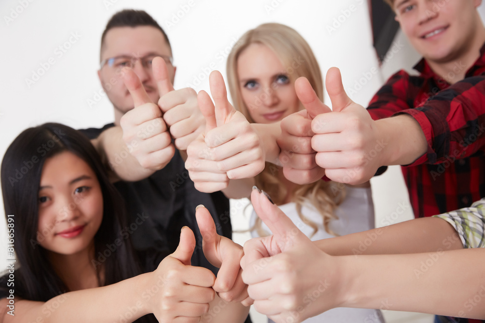 a group of students showing thumb a group of students showing thumb