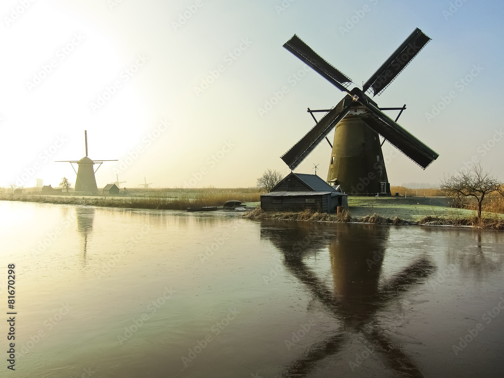 Traditional Dutch windmills at dawn in Kinderdijk, Netherlands