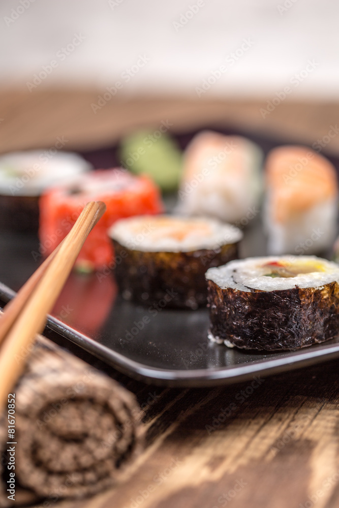 Fresh platter of bean sprouts with chopsticks on wooden table Fresh platter of bean sprouts with chopsticks on wooden table