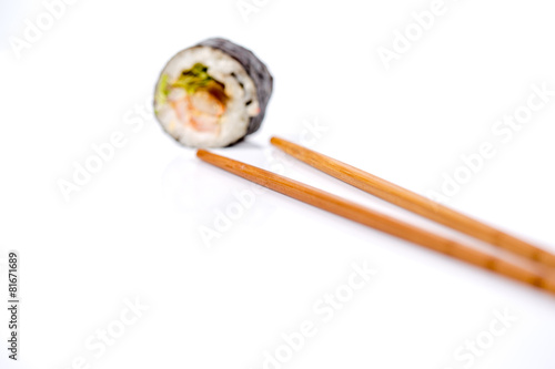 Sushi pieces collection with bamboo chopsticks, isolated on white