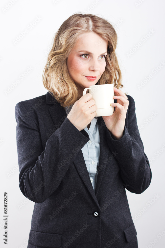 Beautiful blonde with a white cup. coffee break Beautiful blonde with a white cup. coffee break