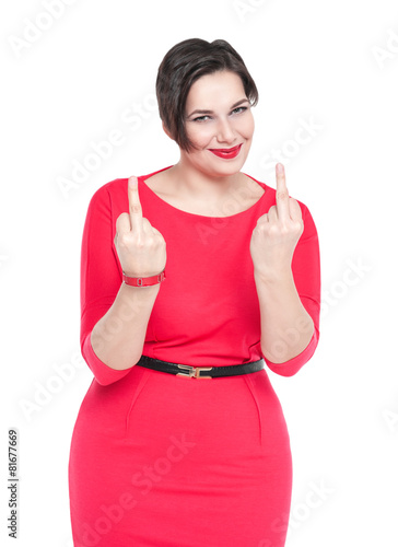 Foto Beautiful plus size woman in red dress showing middle fingers is