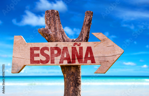Spain (in Spanish) wooden sign with beach background