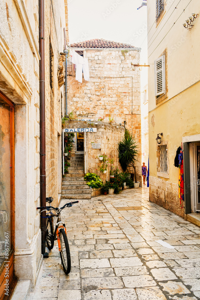 Narrow stone streets on the island of Hvar attract tourists
