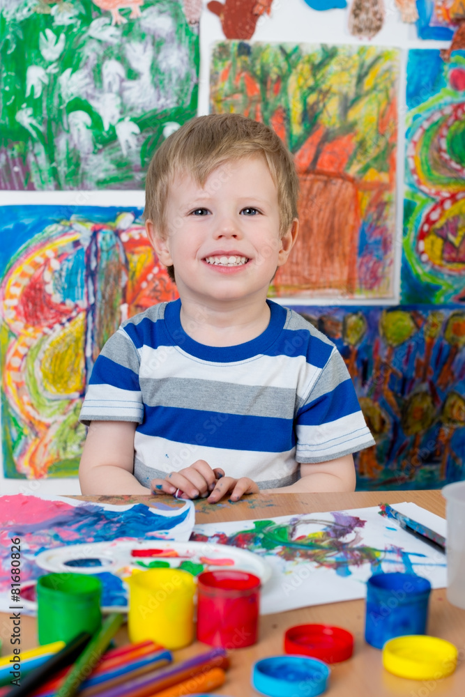 Fototapeta premium Little Boy Painting