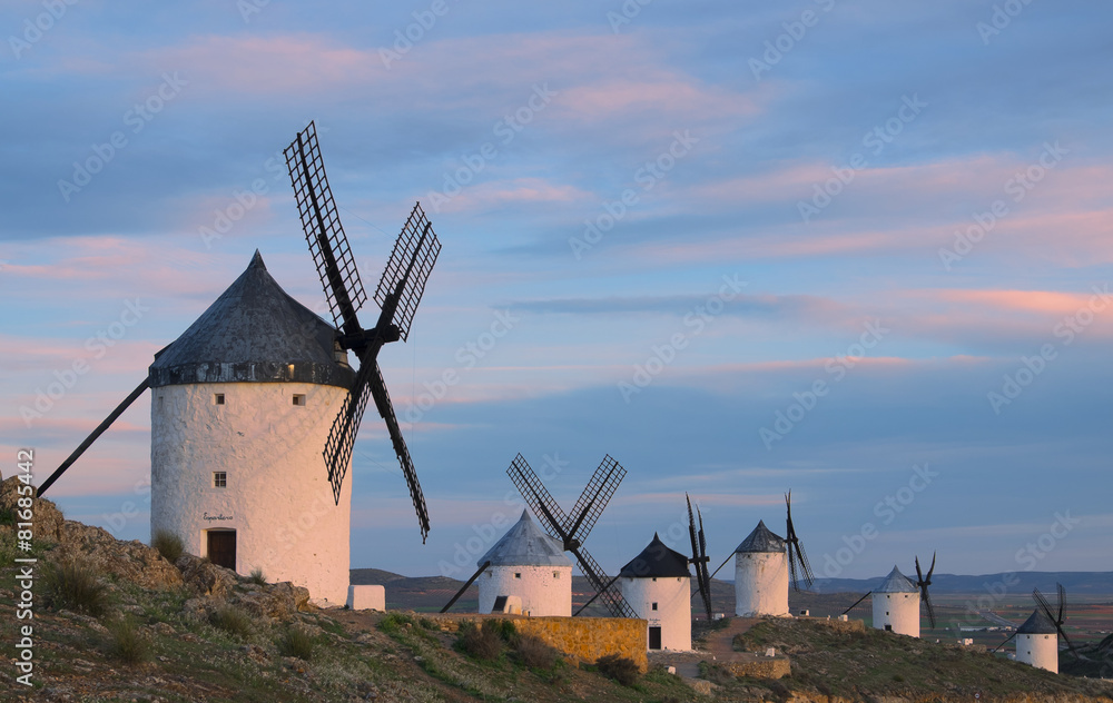 Blue sky and windmills in the background, Consuegra,  Toledo.