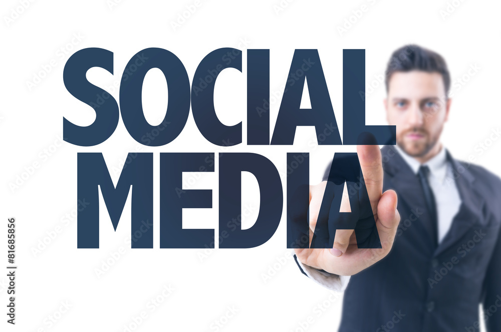 Business man pointing the text: Social Media Business man pointing the text: Social Media