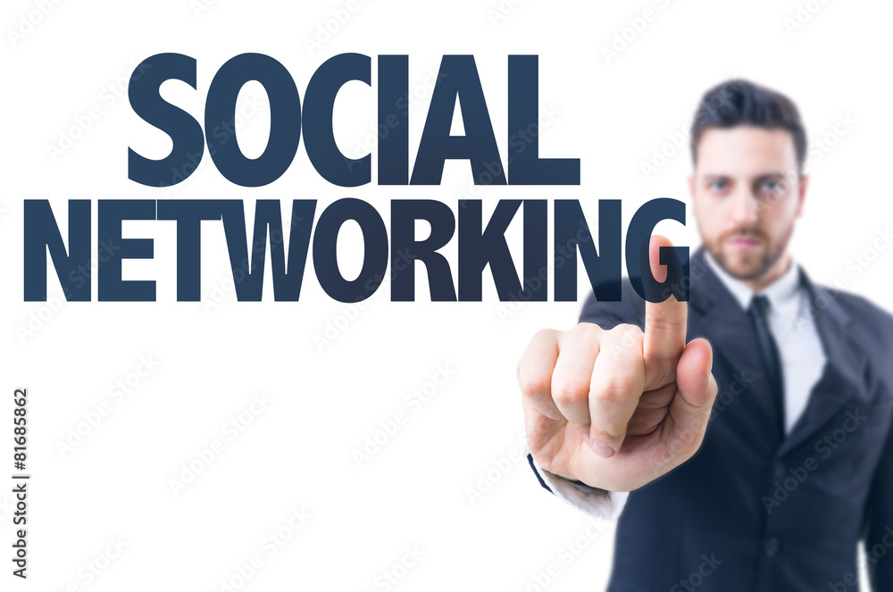 Business man pointing the text: Social Networking Business man pointing the text: Social Networking
