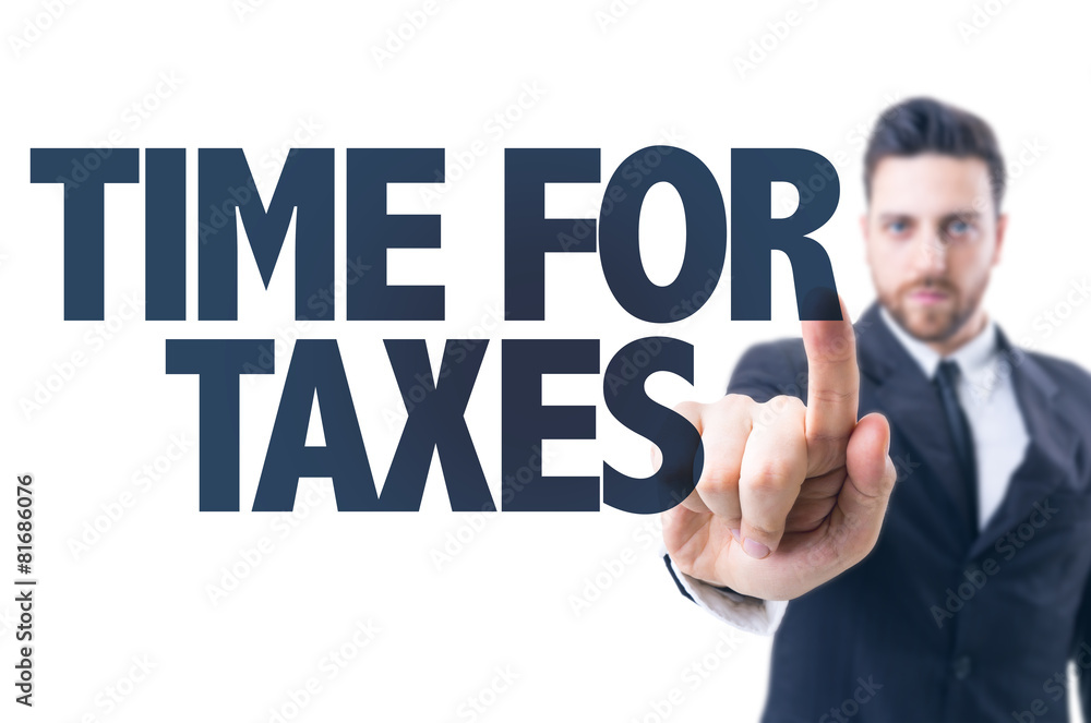 Business man pointing the text: Time for Taxes Business man pointing the text: Time for Taxes