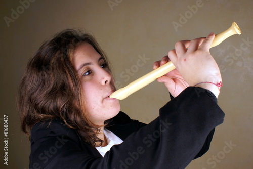 Portrait of a young lady with a flute