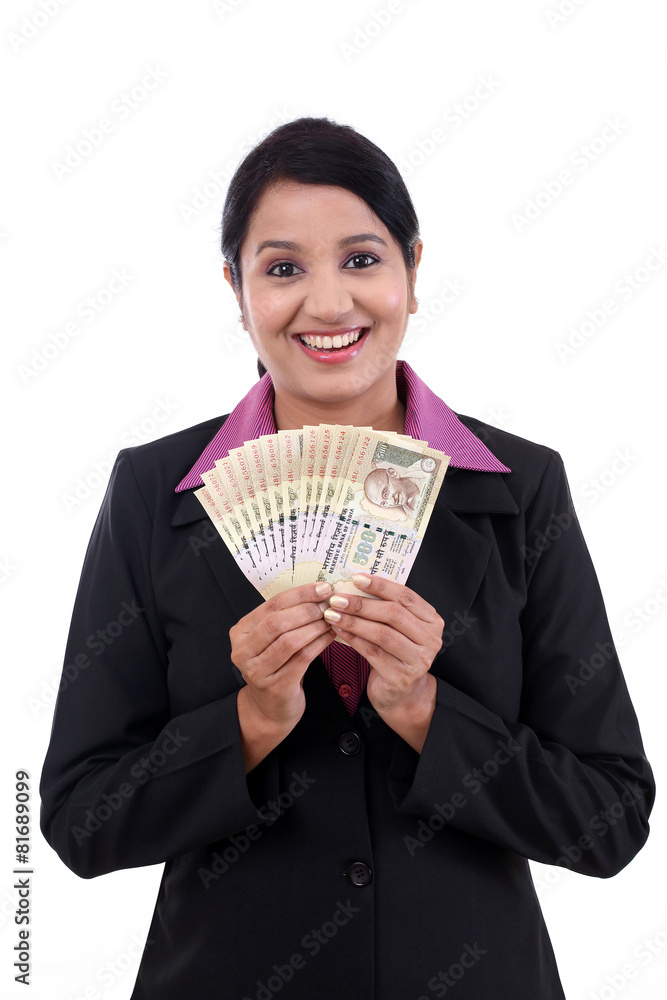 Young business woman holding Indian currency notes Young business woman holding Indian currency notes