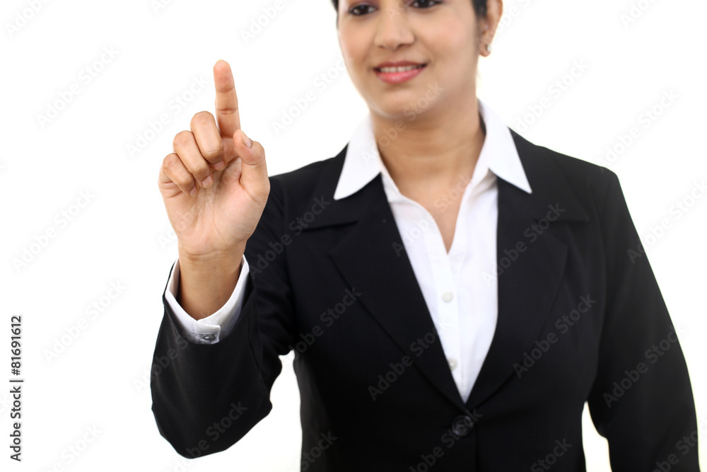 Young businesswoman touching virtual screen Young businesswoman touching virtual screen