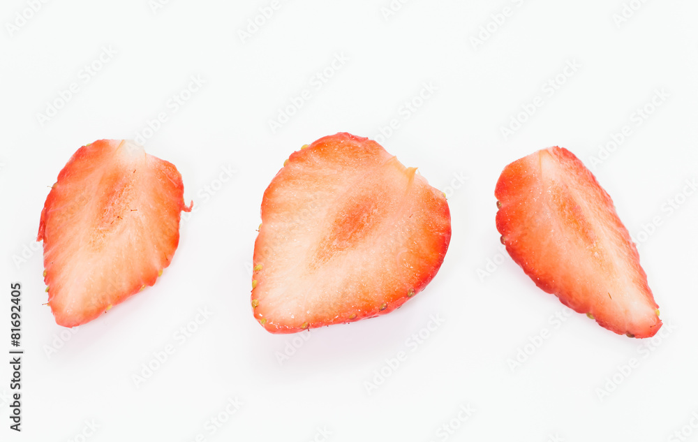 Fresh strawberry slice isolated on white background Fresh strawberry slice isolated on white background