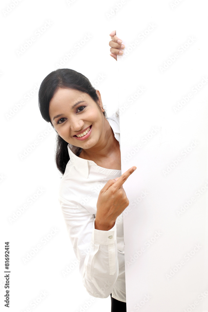 happy business woman showing blank signboard happy business woman showing blank signboard