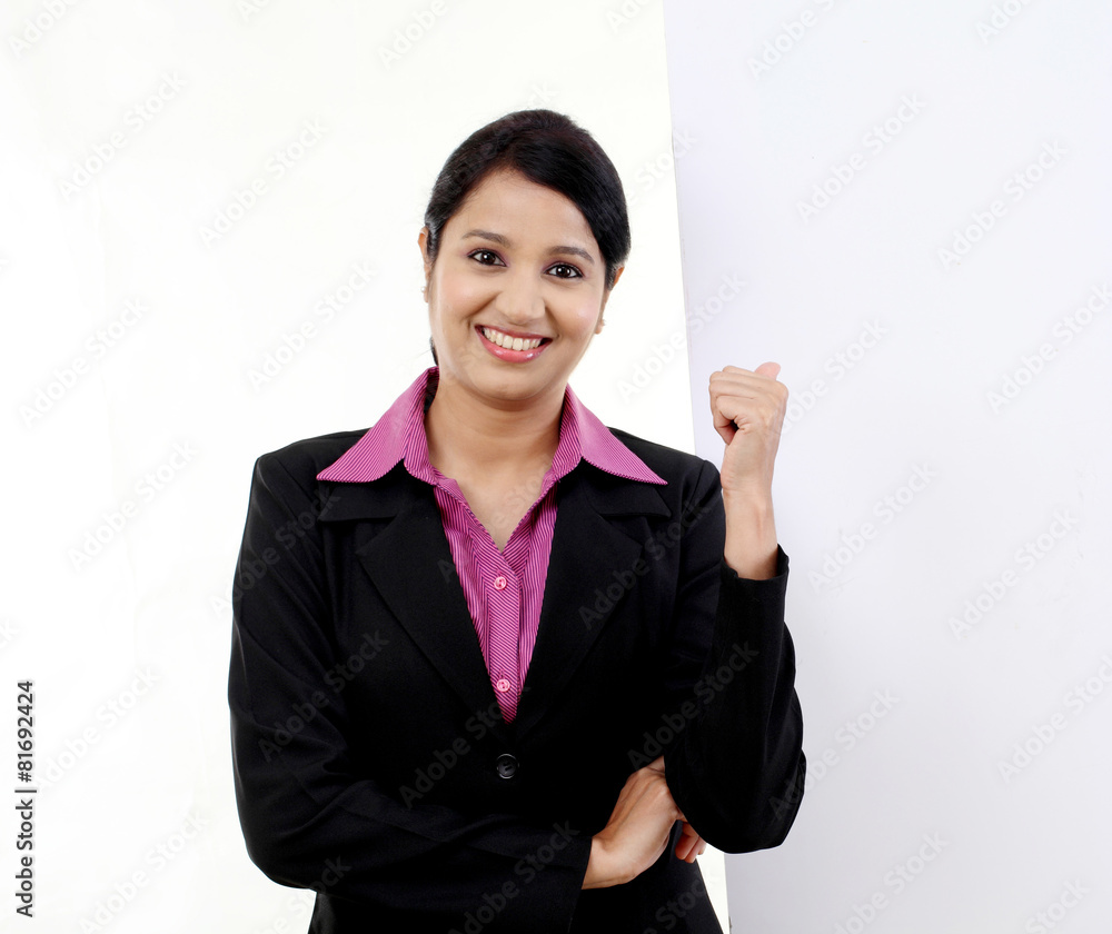 happy business woman showing blank signboard happy business woman showing blank signboard
