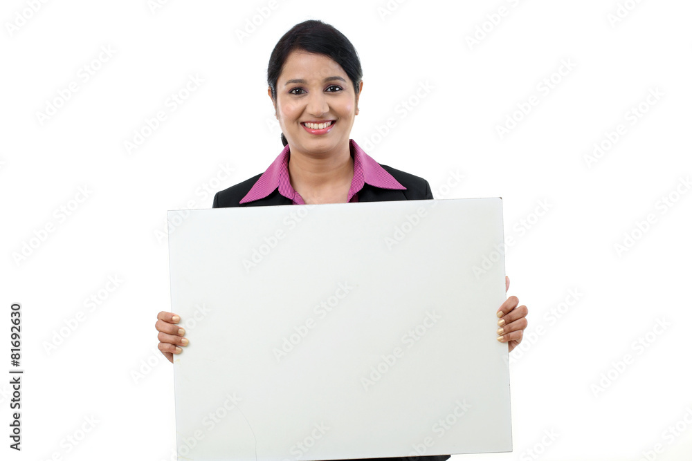 happy business woman showing blank signboard happy business woman showing blank signboard