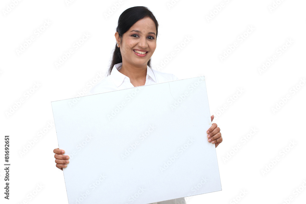 Young happy business woman holding blank signboard Young happy business woman holding blank signboard