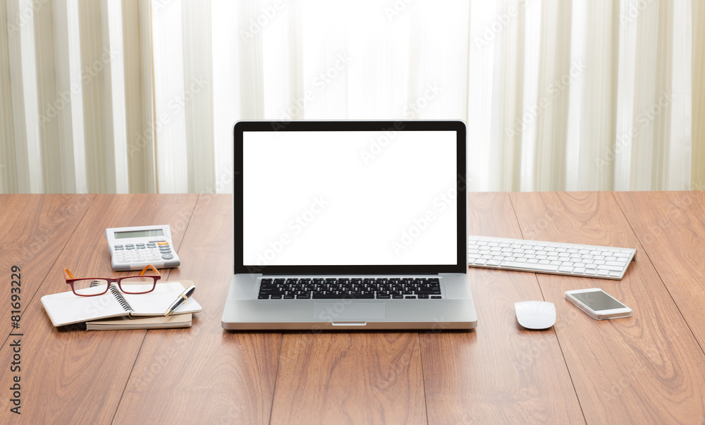 Blank screen laptop computer with office accessories on wooden t Blank screen laptop computer with office accessories on wooden t