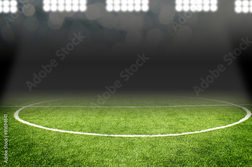 Soccer ball on field in stadium © somkanokwan
