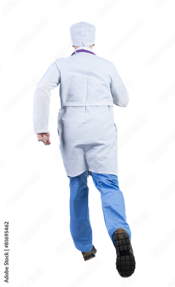 Back view of running doctor in a robe hurrying to help the patie Back view of running doctor in a robe hurrying to help the patie