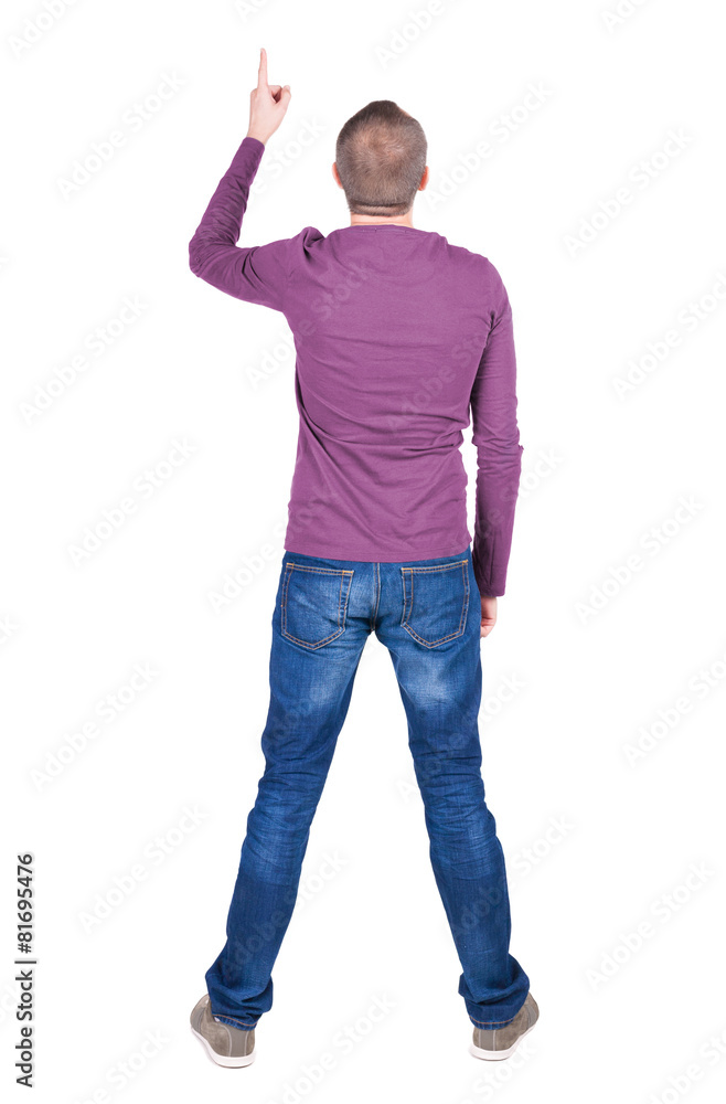 Back view of pointing young men in shirt and jeans. Back view of pointing young men in shirt and jeans.