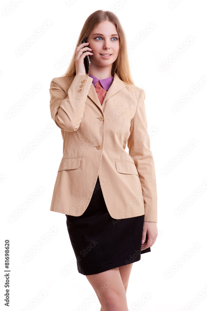 Fototapeta premium Young businesswoman talking to the phone