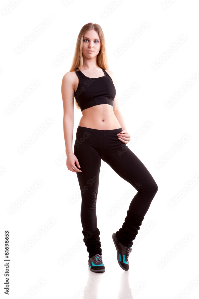 Pretty girl in sport wear isolated over white