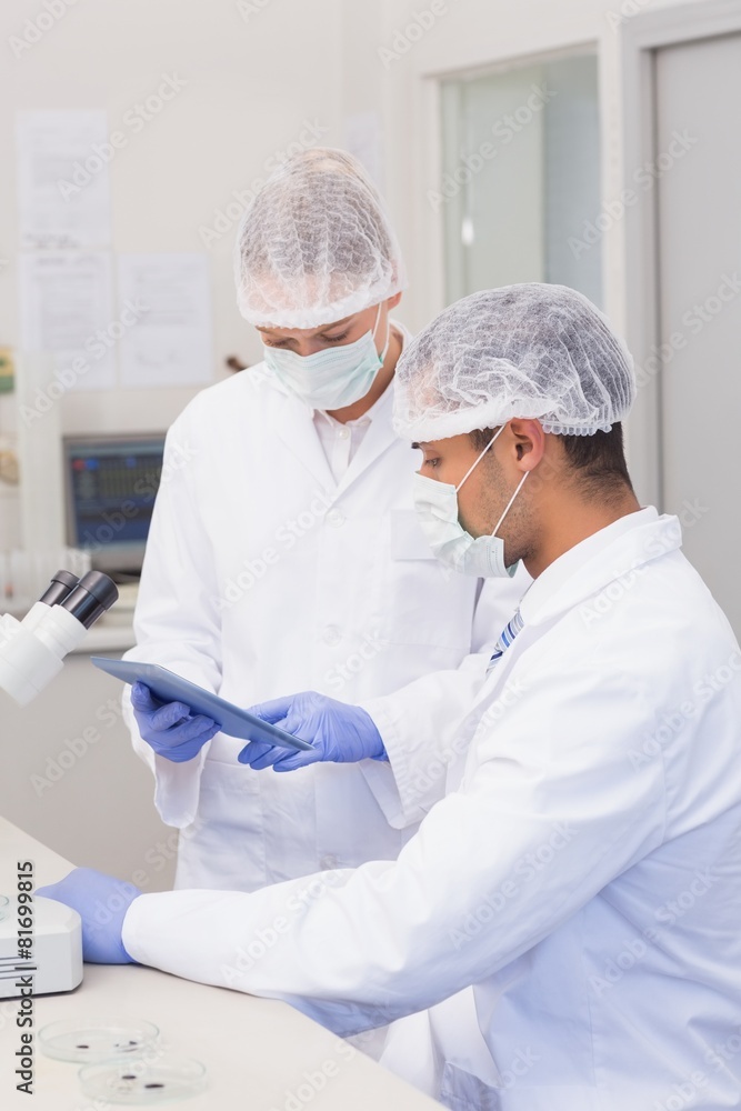 Scientists using tablet pc Scientists using tablet pc