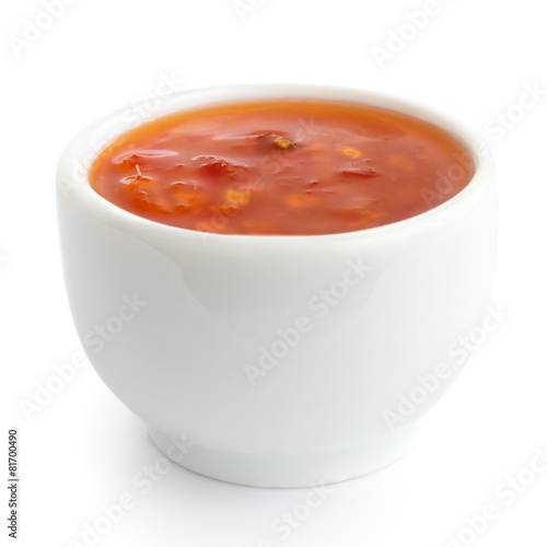 Sweet chilli sauce in small white dish.