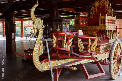 the beautiful sculpture of thailand traditional wheel cart