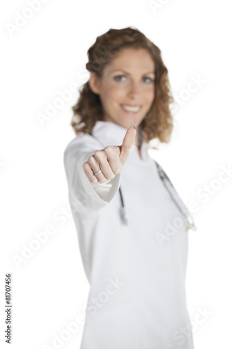 Wallpaper Mural Portrait of female doctor showing thumbs up sign.. Torontodigital.ca