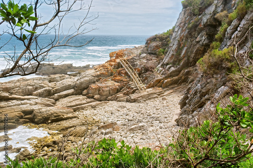 Rocky beach and ladder