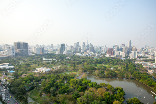Bangkok city view of large Lumpini public park with city zone