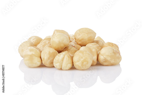 heap of peeled hazelnuts isolated